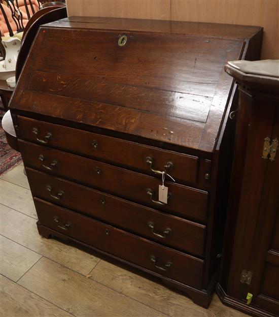 A George III oak bureau W.98cm